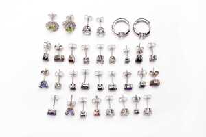 Sixteen pairs of earrings in sterling silver