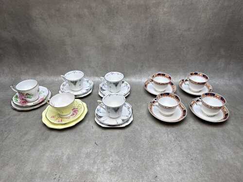 Nine porcelain trios and duos