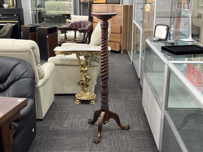 A barley twist timber pedestal