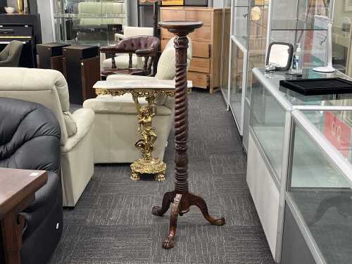 A barley twist timber pedestal