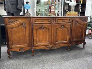 French provincial-style cherrywood breakfront buffet