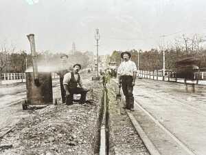 Two Black and white reproductions of early Australian photographs of road builders - 2