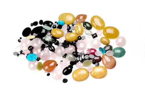 A large collection of cabochon gemstones