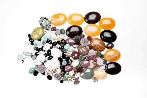 A large collection of cabochon gemstones
