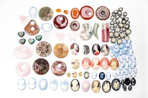 A large collection of cameos, carved gemstones and pendants