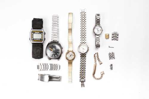 A collection of watches and parts