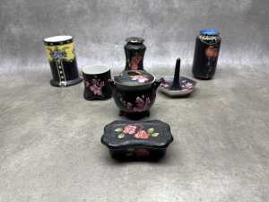 Six antique pieces with various decorations on matte black ground