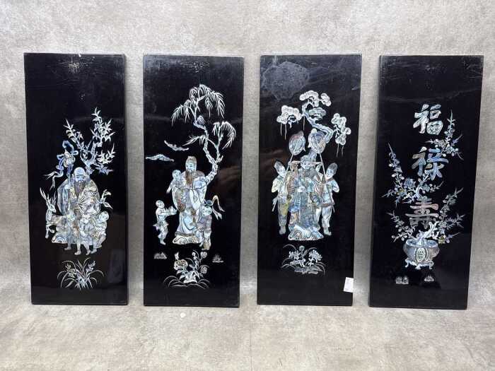Four Chinese black lacquer panels