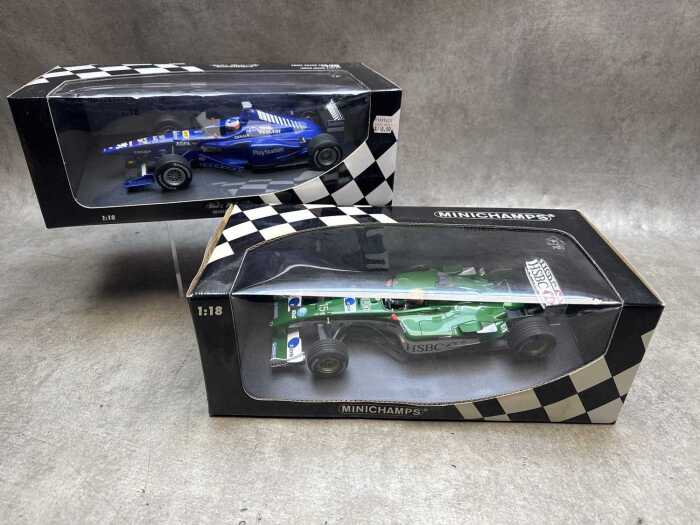Two Minichamps model cars, Jaguar and Peugeot