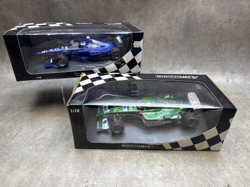 Two Minichamps model cars, Jaguar and Peugeot