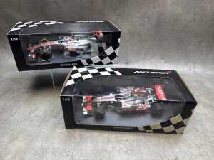 Two McLaren Minichamps 2007 and 2012 model cars