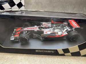 Two McLaren Minichamps 2007 and 2012 model cars - 3