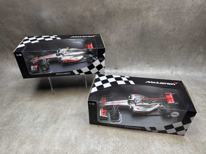 Two McLaren Minichamps 2010 and 2011 model cars