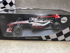 Two McLaren Minichamps 2010 and 2011 model cars - 3
