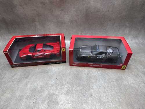 Two Hot Wheels model cars