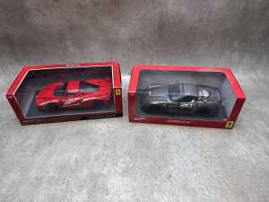 Two Hot Wheels model cars