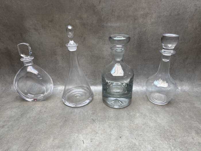 Four modern crystal decanters