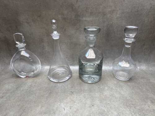 Four modern crystal decanters
