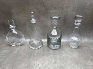 Four modern crystal decanters