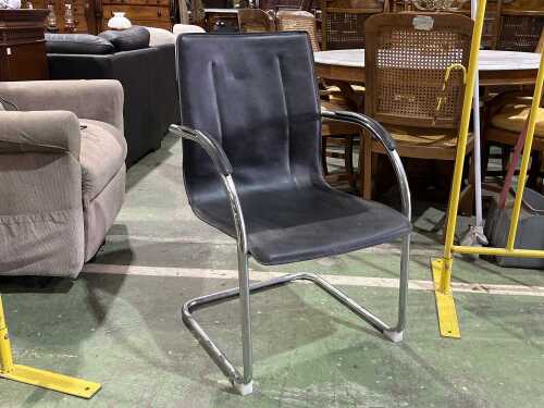 Modern black leather and chrome armchair