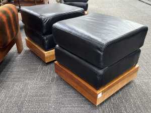 Pair of leather ottomans with timber plinth bases - 2