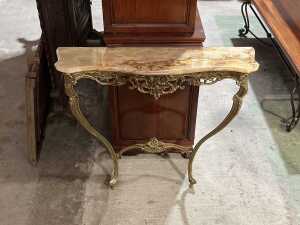 Ornate gilt metal console table with marble top
