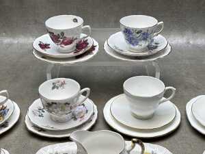 Eight English porcelain trios, together with a sandwich plate and creamer - 2