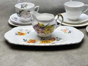 Eight English porcelain trios, together with a sandwich plate and creamer - 5
