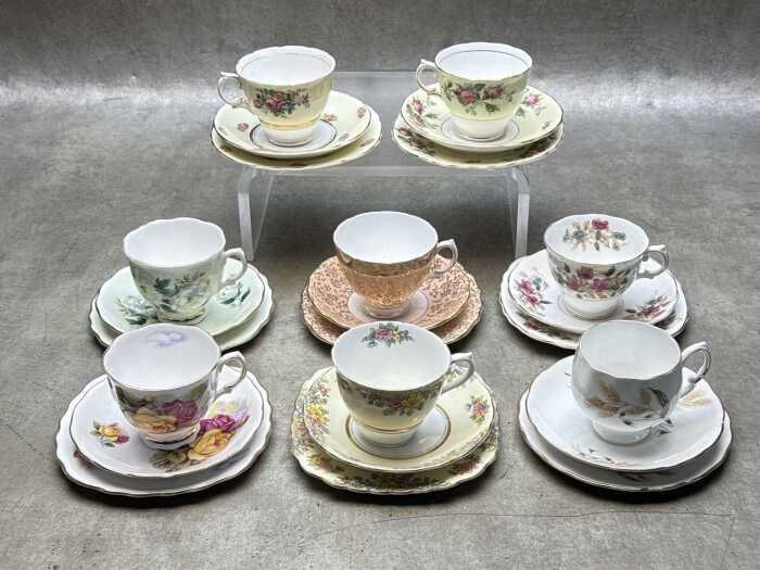 Eight English porcelain trios