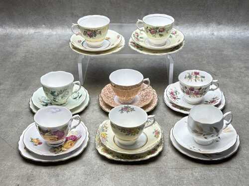 Eight English porcelain trios