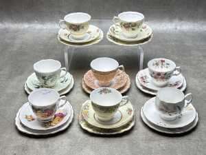 Eight English porcelain trios