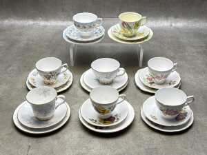 Eight English porcelain trios