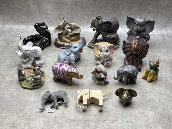 Collection of decoratiove elephant figures and money boxes