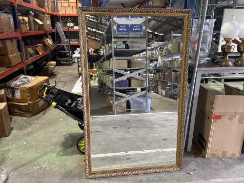 Vintage-style ornate gilt mirror with an acanthus leaf and beaded frame