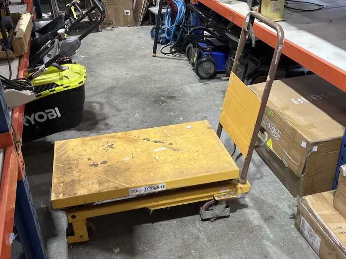 Reflex scissor lift trolley