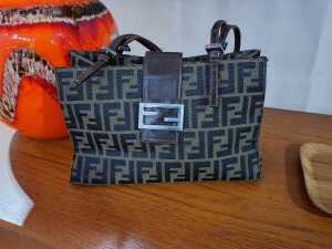 Designer-style shoulder bag in brown tones