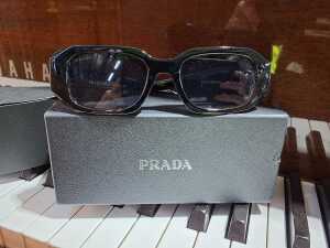 Designer-style shiny black sunglasses