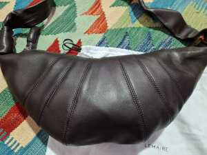 Designer-style brown handbag with stitch detail - 2
