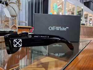 Designer-style sunglasses with original pouch and box. - 2
