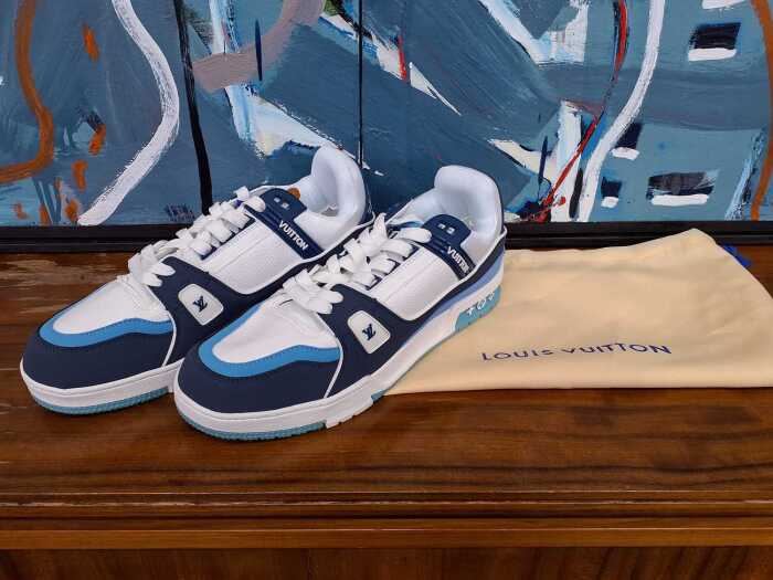 Designer-style sneaker in blue and white, size 44