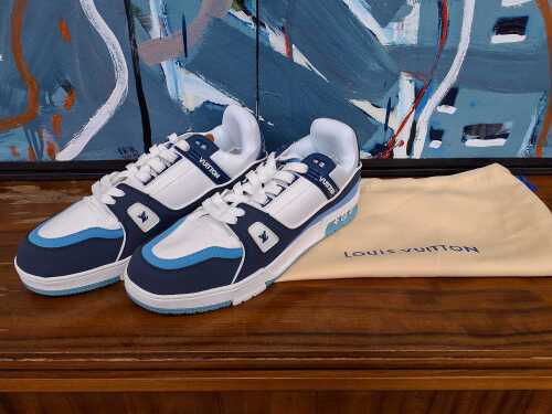 Designer-style sneaker in blue and white, size 44