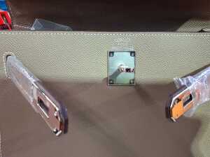 Designer-style handbag in taupe with silver-tone hardware. - 4