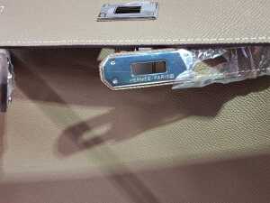 Designer-style handbag in taupe with silver-tone hardware. - 5