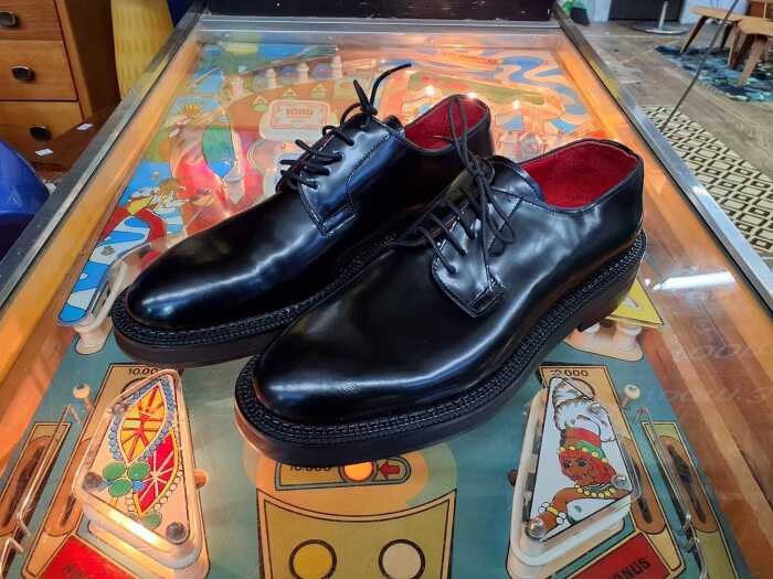 Designer-style black leather business shoes, size 42