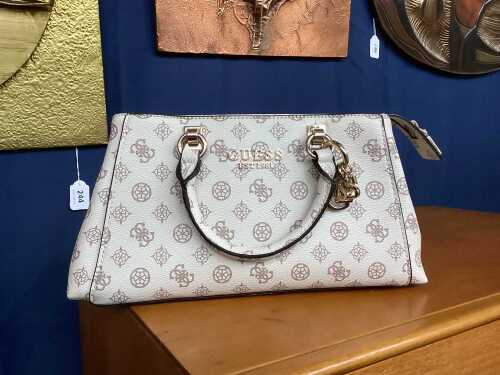 Designer-style handbag with white and gold tones