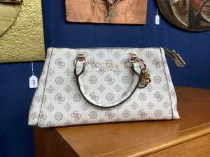 Designer-style handbag with white and gold tones