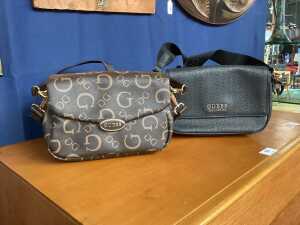 Two designer-style handbags in brown and black tones