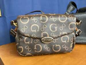Two designer-style handbags in brown and black tones - 2
