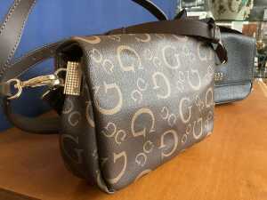 Two designer-style handbags in brown and black tones - 4