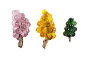 Three mid-century decorative lucite bunches of grapes